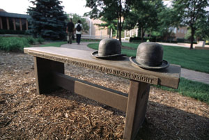 photo of wright brothers hats on bench