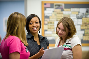 photo of students and staff member