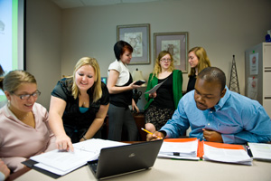 photo of students working together