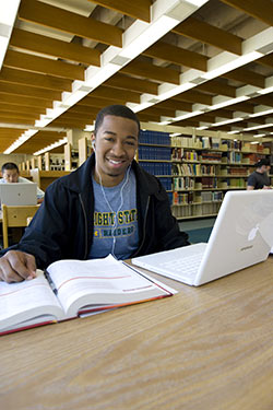 photo of a student in the library