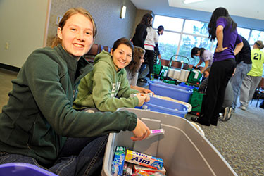 photo of students participating in a service learning project