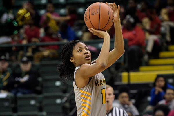 Wright state raider takes a shot at a basketball hoop
