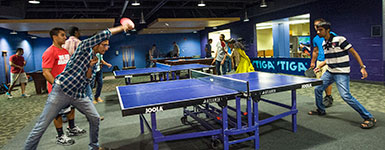photo of students playing ping pong