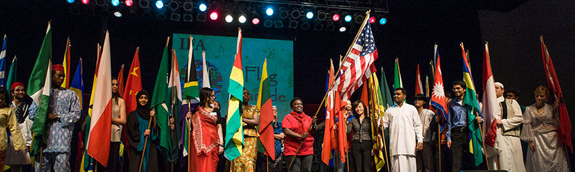 photo of people on stage at the international friendship affair