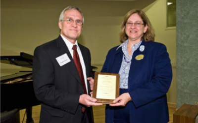 Dr. Donna Miles Cury, Ph.D., Associate Dean, Graduate Programs and Associate Professor College of Nursing and Health , was award