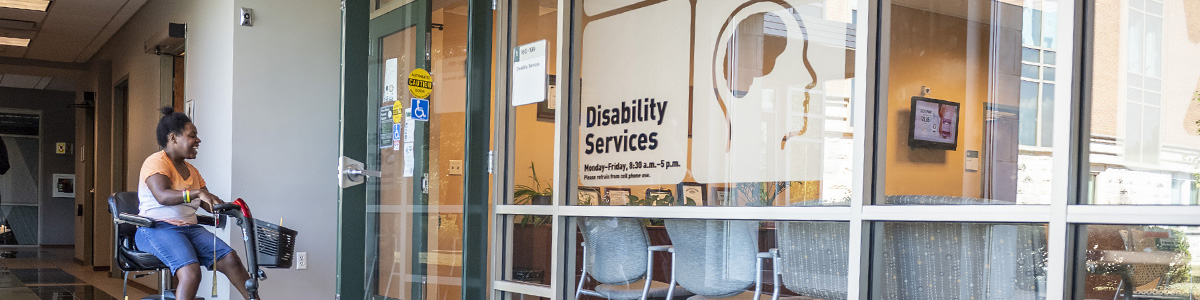 photo of a student entering the office of disability services