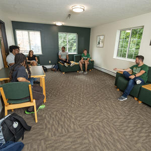 photo of students in a dorm lounge