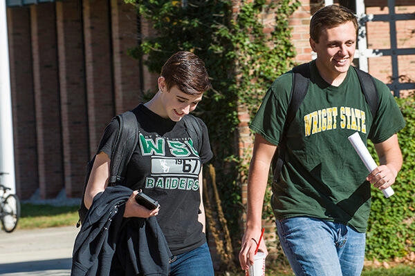 photo of students walking outside on campus