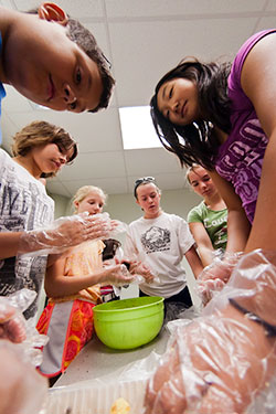 photo of kids in a classroom working on a project