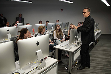 photo of tom hanks and students in the tom hanks center for motion pictures