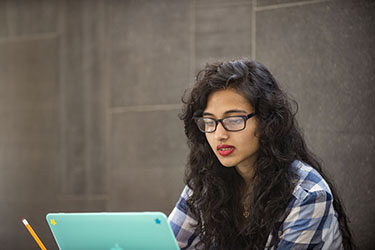 photo of a student using a laptop