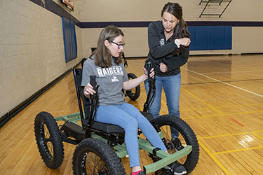 photo of a student using a raider rig