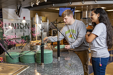photo of students serving themselves in union market
