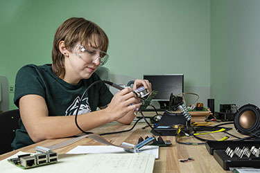 photo of two students working in a lab