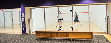 photo of two people playing raquetball