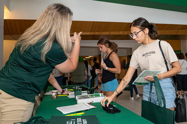 Wright state representative helping students