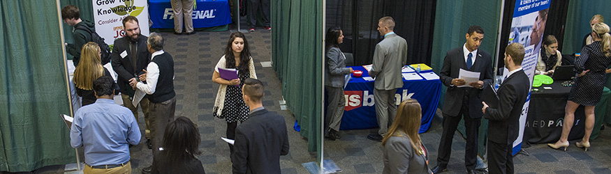 photo of students and employers at a career fair