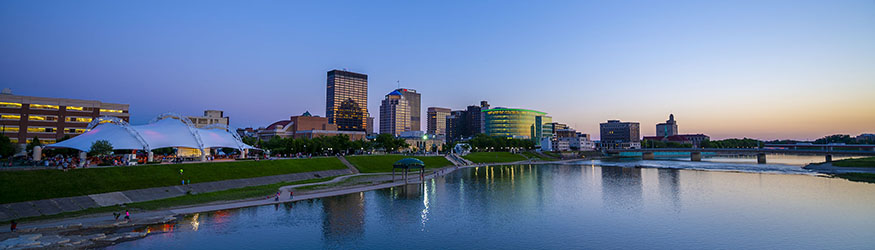 photo of the downtown dayton skyline in the evening
