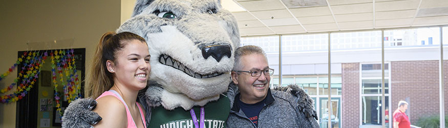 photo of a student and father with Rowdy