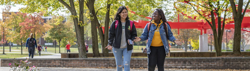 photo of students walking outside on campus