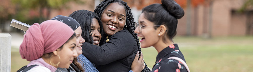 photo of students outside on campus