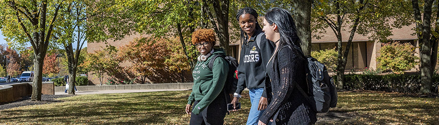 photo of students walking outside on campus