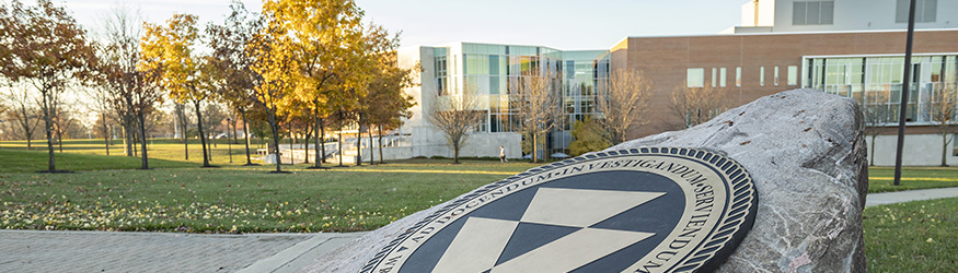 photo of the university seal and the student success center