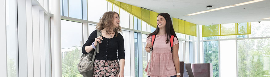 photo of students walking in the student success center