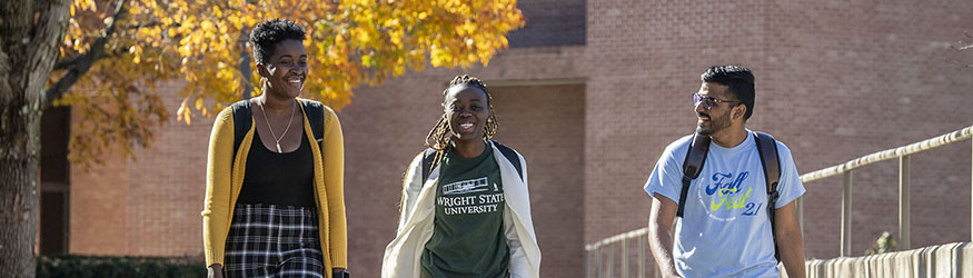 photo of students walking outside on campus