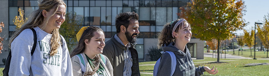 photo of students walking outside on campus