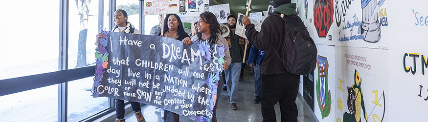 photo of students marching in the tunnel