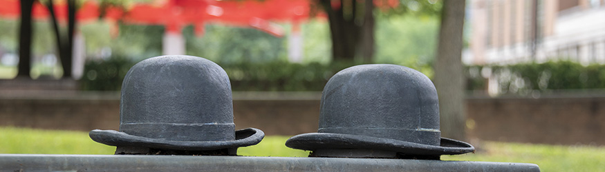 photo of the wright brothers hats on a bench