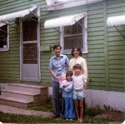 Family outside of house