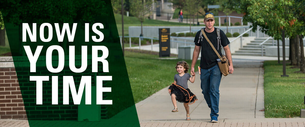 Father walking his daughter around campus in between classes