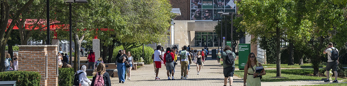 photo of students walking outside on campus
