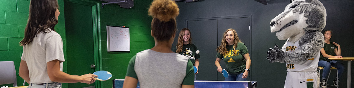 photo of students playing table tennis in the student union