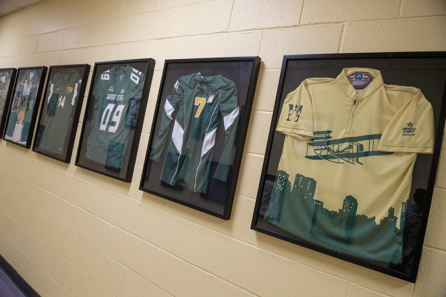 photo of framed intramural sport jerseys in the student union
