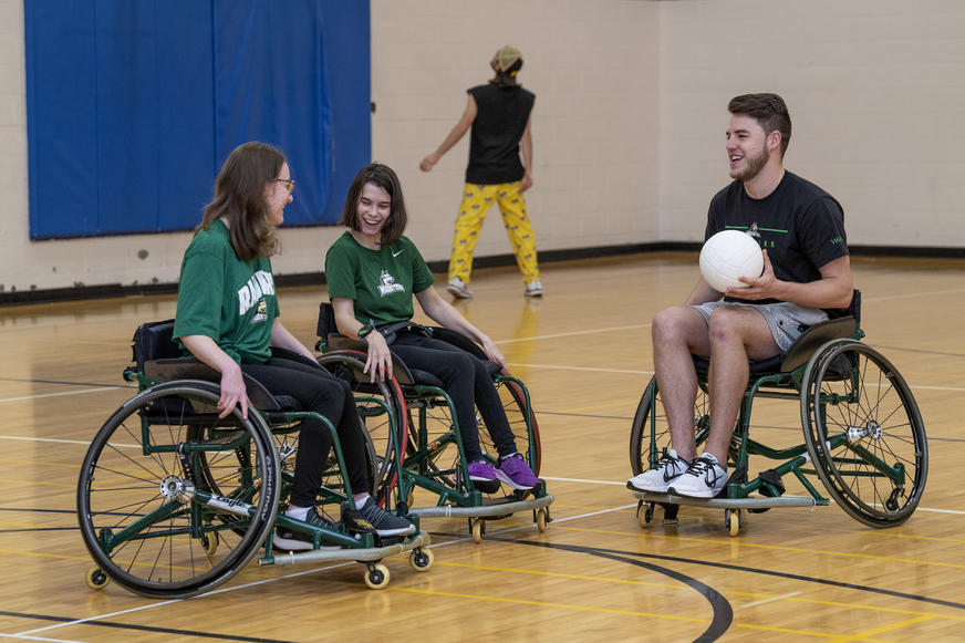 photo of students playing adapted recreation basketball