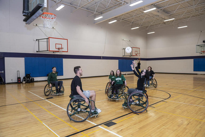 photo of students playing adapted recreation basketball