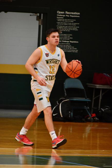 Club Basketball player dribbling ball