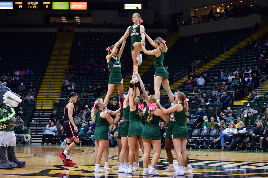 Competitive Cheer stunting during halftime