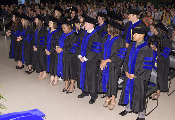 Psychology students standing for commencements 