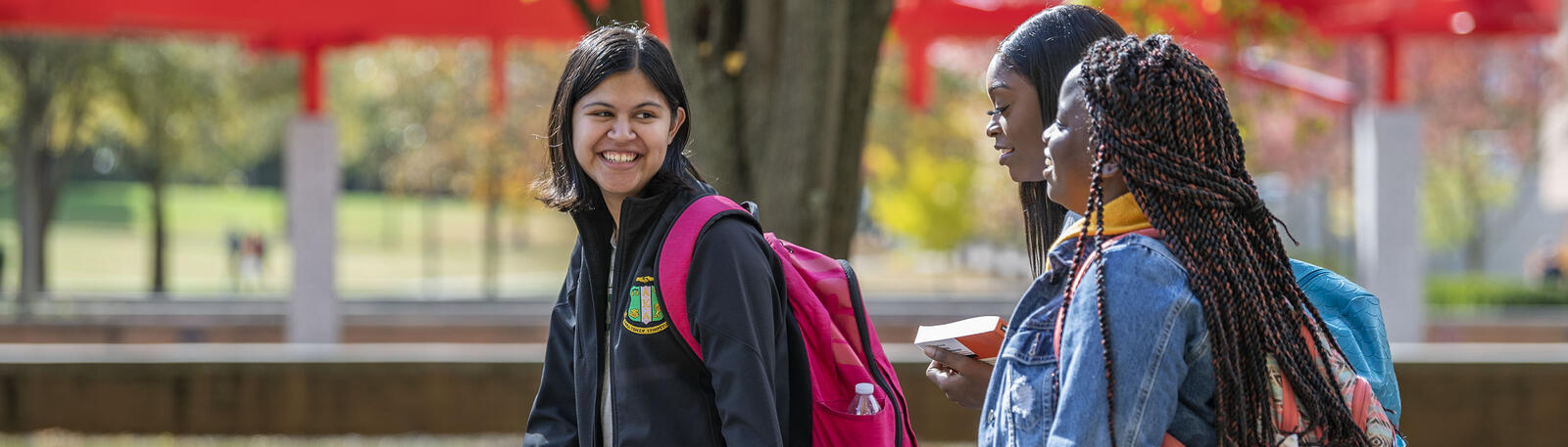 photo of students walking outside on campus