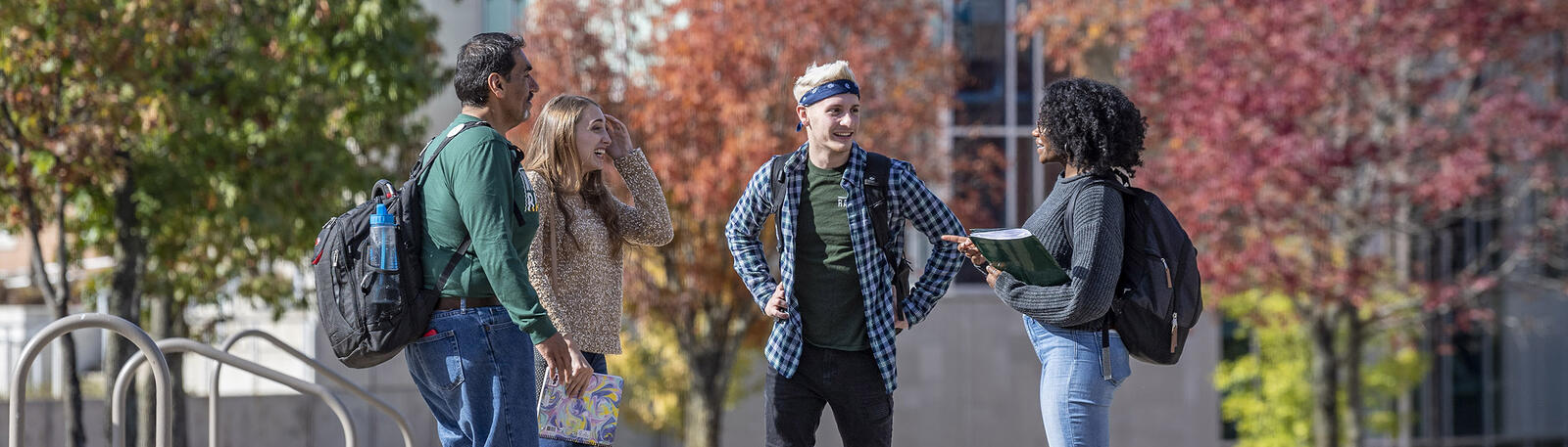 photo of students standing and talking outside on wright state's campus