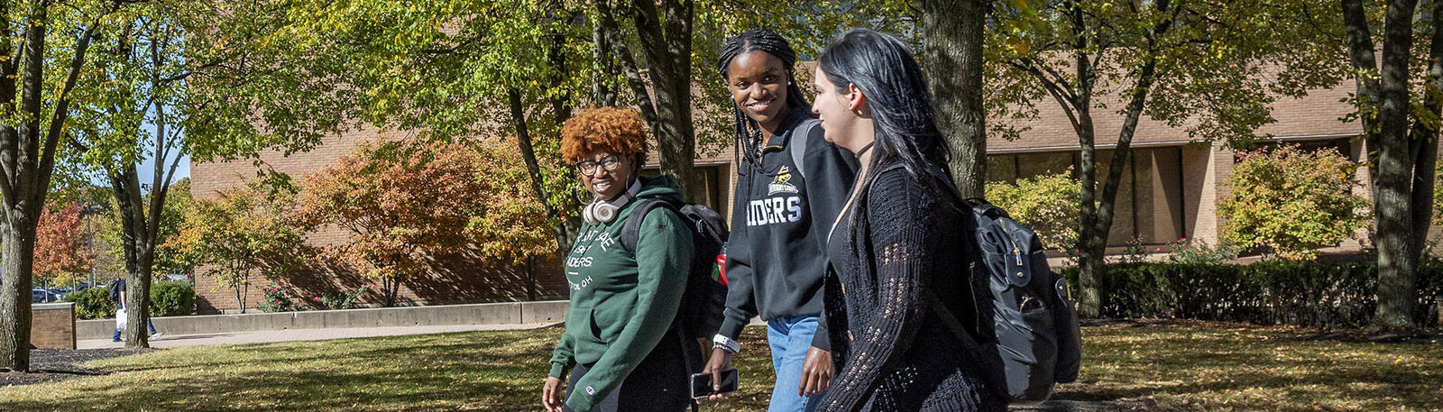 photo of students walking outside on campus