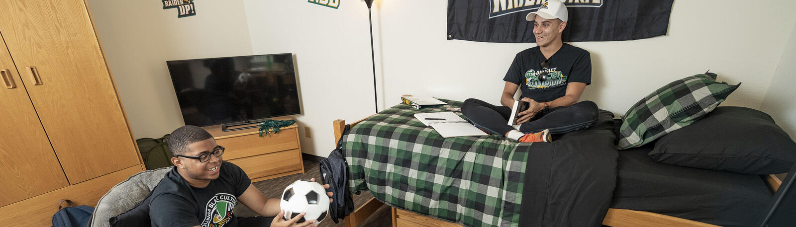 photo of students in a dorm room