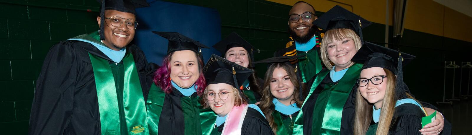 photo of happy graduates at a wright state commencement ceremony