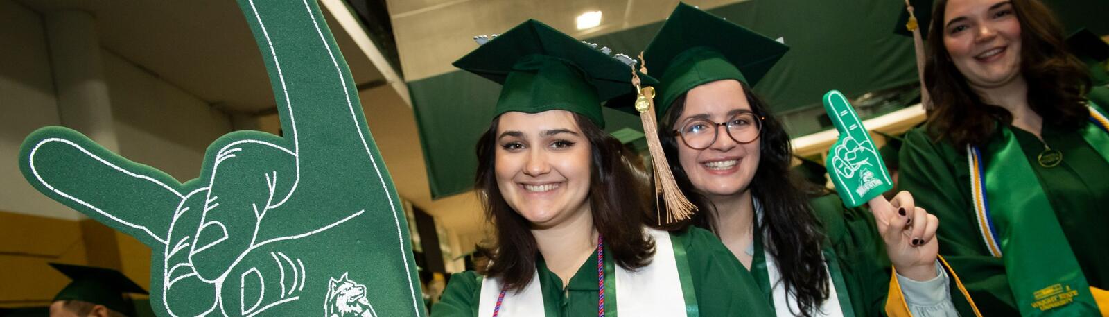 photo of happy graduates at a wright state commencement ceremony