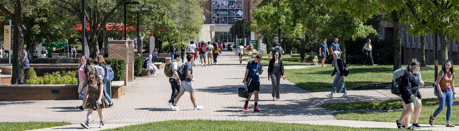 photo of students walking outside on campus