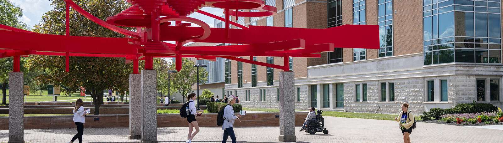 photo of students walking outside on campus